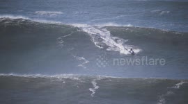 HUGE XXL WAVE SURFER in NAZARE