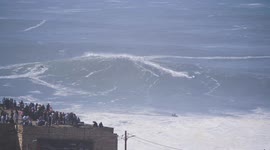 Big wave rider charge huge waves during recent MASSIVE swell in Nazare