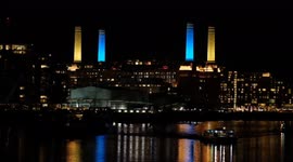 Battersea Power Station chimneys illuminated in the colours of the Ukrainian flag