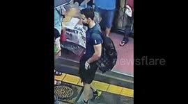 Handsome Australian tourist 'seen on CCTV stealing from shop' caught after good looks help police identify him