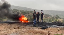 Palestinian protesters clash with Israeli forces following a protest against the establishment of Israeli outposts