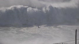 Jetski driver close call insane massive wave during big surf rescue in Nazare