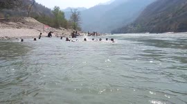 Kid swimming competition on River.  enjoying the day in Nepal.
