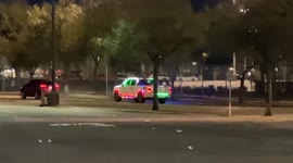 Houston Uber driver in a white pickup truck allows riders to ride in the back of truck bed