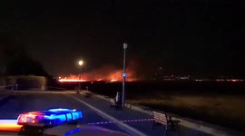 Huge fire breaks out on Parkgate marshland prompting evacuation of nearby homes