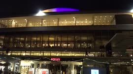 Blue and yellow lights of Royal Festival Hall on the South Bank of the River Thames