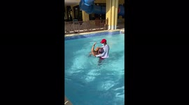 Jamaican woman rescued from pool after descending water slide