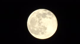 The full Worm Moon shines bright over London