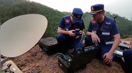 Portable satellite station set up for rescue work as passenger plane crashes in China