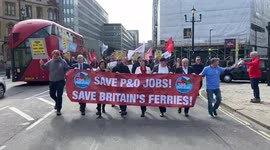 RMT Union members and P&O Ferries staff march through Westminster
