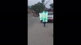 Diffrent marketing method in Nepal. Carrying board and walk around the market.