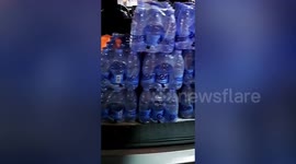 Villagers deliver supplies to officials searching plane crash site in China's Guangxi