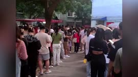 University students line up to donate blood for potential plane crash survivors in China's Guangxi
