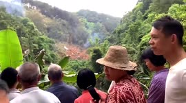 Villagers record crash site after passenger plane falls out of sky in China's Guangxi