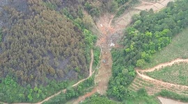 Drone footage showcases difficult terrain for rescuers searching for China plane crash