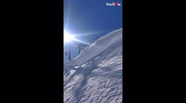 'Skier goes for a GAINER off a cliff for the first time *BAD IDEA*'