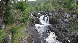 salmon jumping and Soak in the view at Rogie Falls, just north of Contin outside inverness ,Scotland