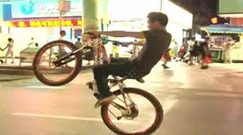 Cyclists put on a show on Chinese street