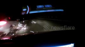 Cars spark in highway crash during night travel