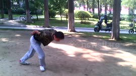 Man does front flips with hands tied behind his back