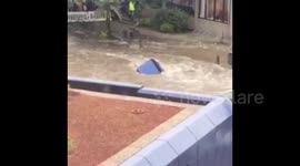 Car swept along by Amsterdam flooding