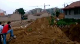 Villager fires self-made mortar cannon to resist demolition