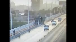 Truck crashes off bridge after killing a cyclist