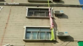 Woman ties bed sheets together to escape ex by jumping from windows