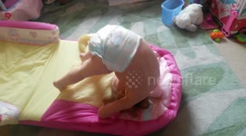 Toddler learns to forward roll for the first time