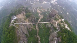 Beautiful drone footage of transparent bridge in China