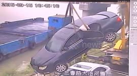Driver tries to park... crashes into river