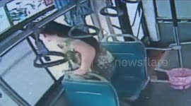 Woman misses bus stop... jumps out the window