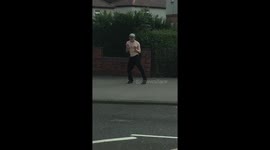 Hilarious video of semi-naked man dancing on the street