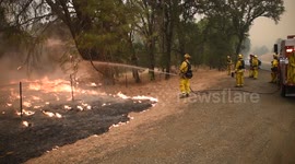 VALLEY FIRE CALFIRE Crews Hold Fire From Crossing Highway 29