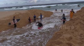 Surfing water surge from lagoon release