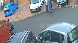 Shocking moment champion darts player batters neighbour with a brick