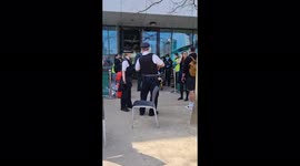 Man in white suit seen as first responders outside London Aquatics Centre after incident on Wednesday morning
