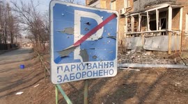 Shrapnel from Russian air strike damages apartment building in Kyiv, Ukraine.