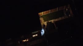 Merseyside police search dog searching a garden in St Helens by drone