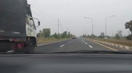 Garden hoe flies off truck and smashes into oncoming car's windshield