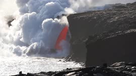 Incredible footage shows stream of lava pouring into ocean from Hawaii volcano