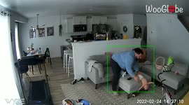 Distracted dad's quick reflexes help save his baby from falling off sofa