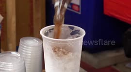 Market stall makes awesome Coca Cola slushies to beat the heat in Thailand