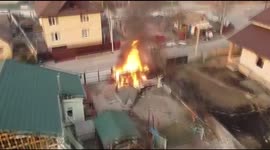 Drone footage captures burning homes and devastation in embattled Ukrainian town of Irpin