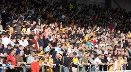 Maidstone United fans celebrating taking the lead against St Albans City on 26 March 2022