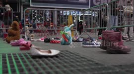 Demonstrators in New York line up empty children's shoes for Ukraine's children
