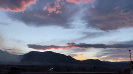 Sun Sets Over Boulder Colorado While NCAR Wild Fire Continues To Burn