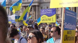 People watching 'London Stands with Ukraine: March and Vigil' stage at Trafalgar Square on 26/03/22