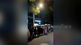 Residents in Shanghai line outside supermarkets for groceries before four-day lockdown begins