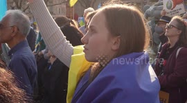 Side view of a girl at Trafalgar Square for the London Stands with Ukraine: March and Vigil